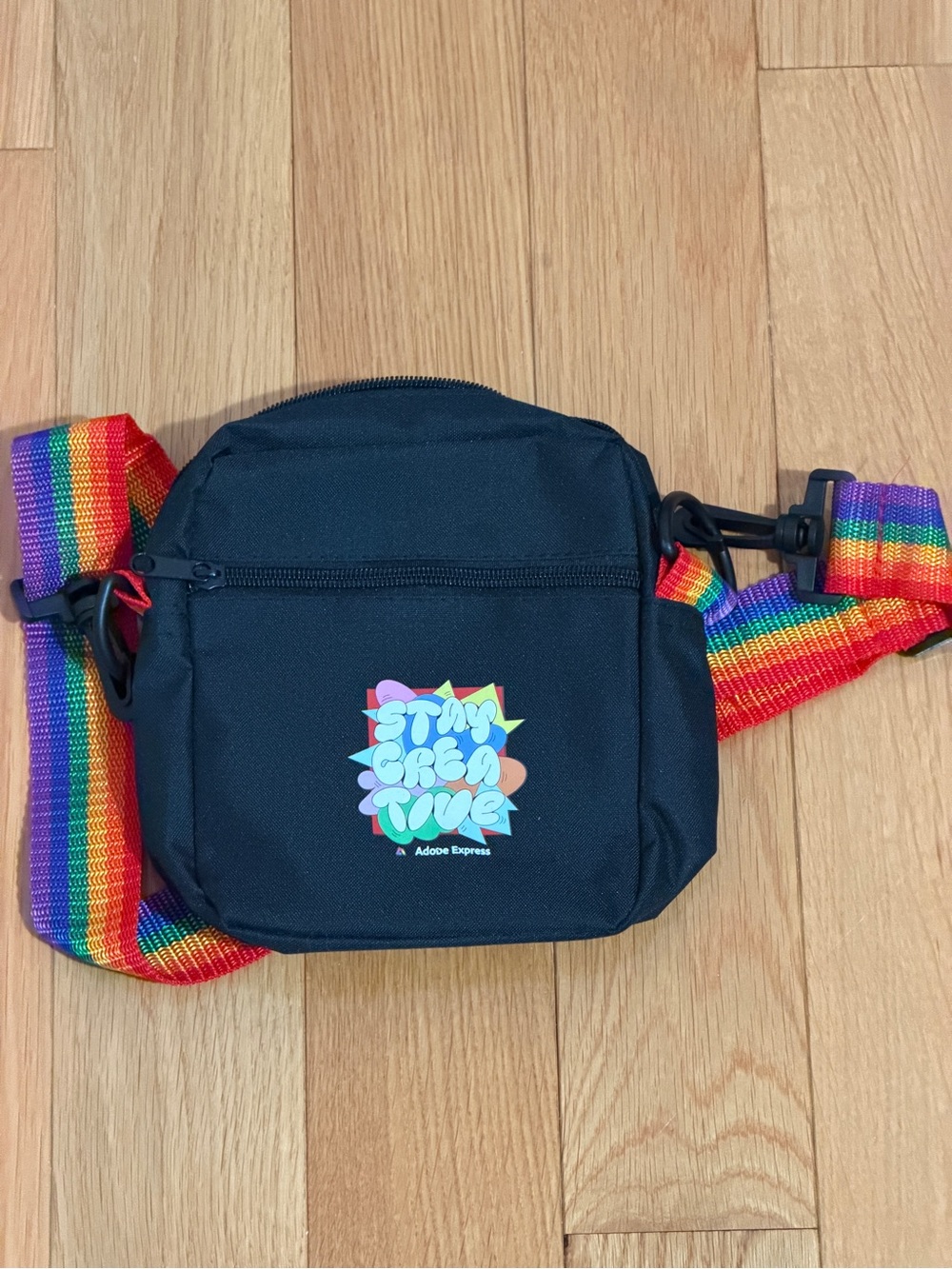 Adobe Black Crossbody with Rainbow Strap and 'Stay Creative' Graphic